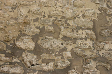 Laying from stones of an ancient wall of an ancient fortressの写真素材