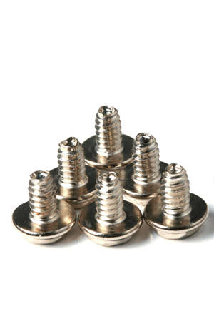 The chromeplated fixing screws for a computerの写真素材