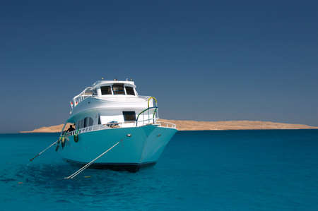 The ship standing in the sea near coral a reefの写真素材