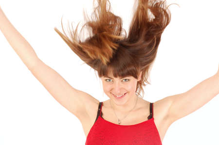 longhair girl toss up herself hair. isolated on whiteの写真素材