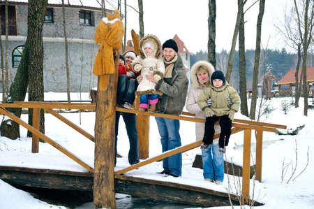 Happy family of six people spend time outdoors togeatherの写真素材