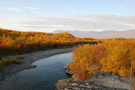 Scenic river in autumnの写真素材