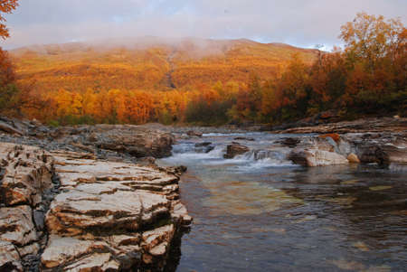 Scenic river in autumnの写真素材
