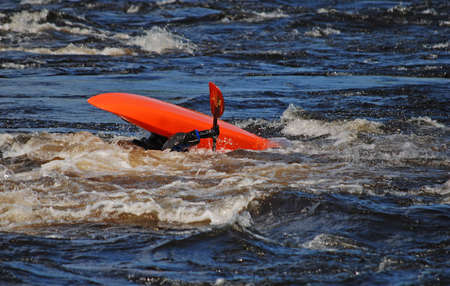 Shutterspeed surfer going down in to the waterの写真素材
