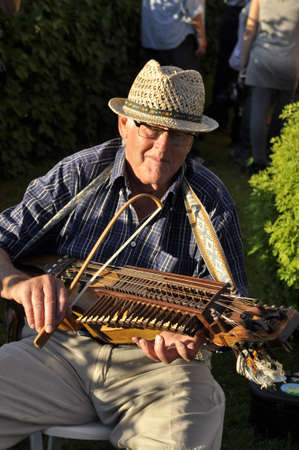 BINGSJO, SWEDEN - JULY 6: Fiddlers and accordion ensamble at Bingsjostamman music festival in...