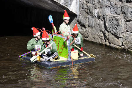 Uppsala, Sweden - 30 April: A participant in a funny boat racein action at Uppsala, Sweden April 30,...