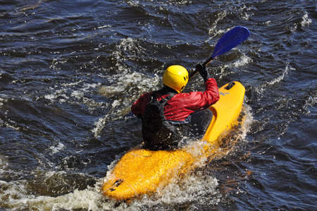 Shutter-speed surfing in a river at springのeditorial素材