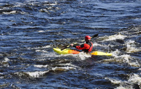 Shutter-speed surfing in a river at springのeditorial素材