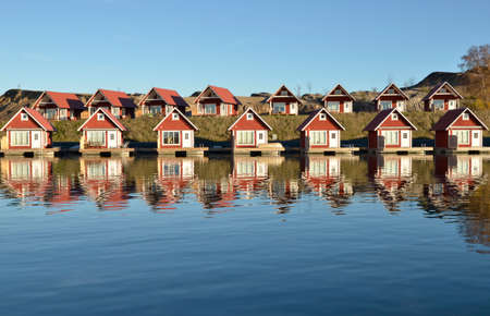 Fisherman huts at scandinavian coastの写真素材