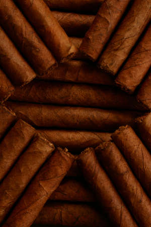 Pattern of cigars arranged next to each othersの写真素材
