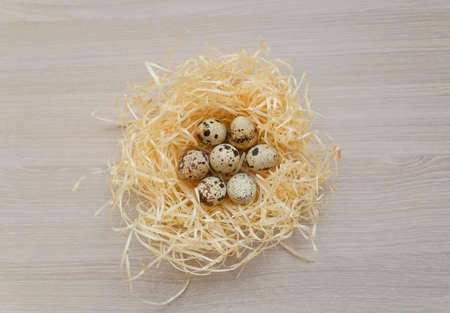 Easter eggs decorative flatlay minimalist concept on the wooden background, decor for springtime, Easter holiday symbol, simple designの写真素材