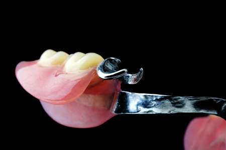 Partial Denture on black backgroundの写真素材