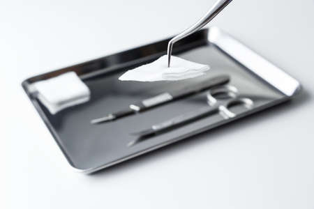 some medical - dental  instruments on the trayの写真素材