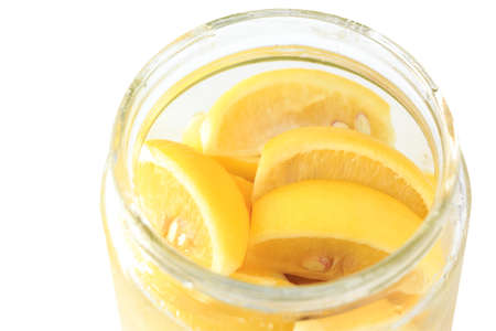 Lemon in salt for seasoningの写真素材