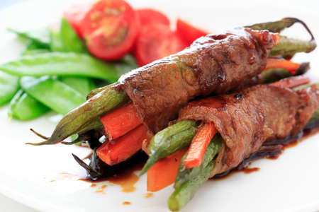 Vegetable wrapped by meat  with Teriyaki sauce