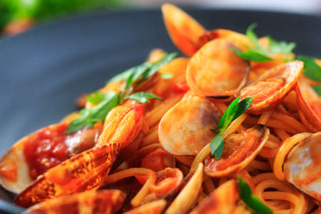 Clam and tomato sauce spaghettiの写真素材