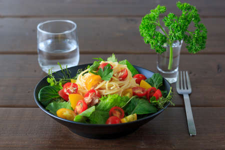Cold spaghetti with tuna and fresh tomatoの写真素材