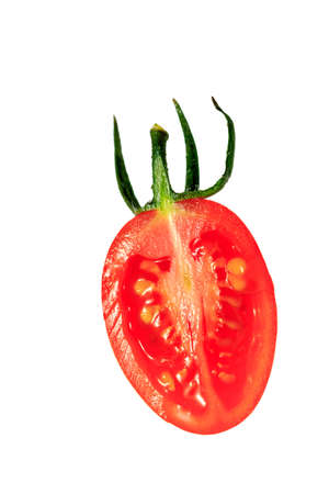 Bisected tomato on the white backgroundの写真素材