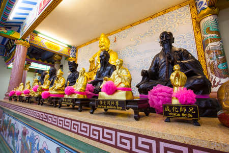 Golden statue of a Chinese god in Chinese temple Ranong,Thailandのeditorial素材