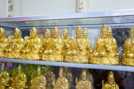 Golden statue of a Chinese god in Chinese temple Ranong,Thailandのeditorial素材