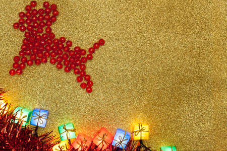 Christmas Decoration on Gold Background, red reindeer