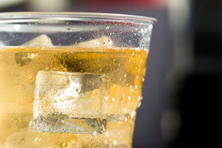 cold beer with ice in Disposable Cup
