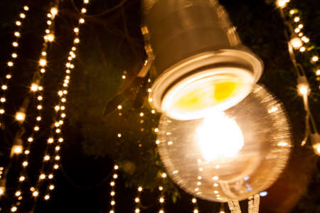 Gold lights abstact background in night timeの写真素材