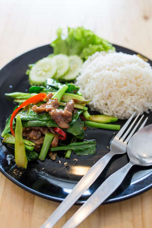 crispy pork with Kale and rice, thai foodの写真素材