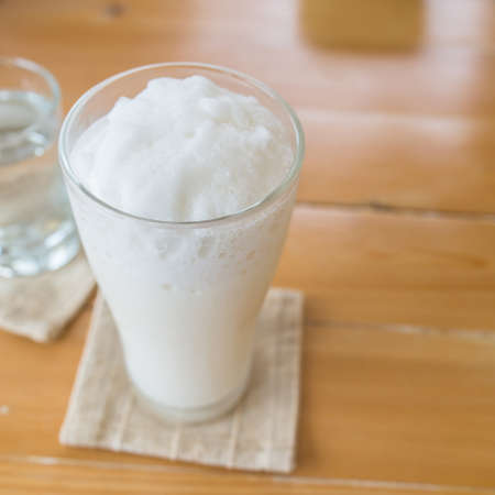 milkshake on a wooden table.の写真素材