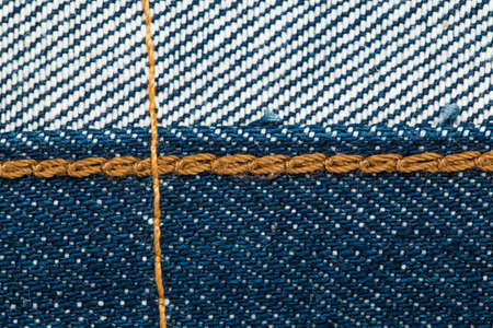 inside Blue denim jeans texture with seams.