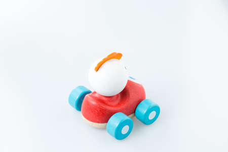 Wooden toy car on white background.の写真素材