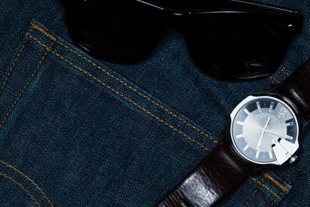denim jean with sunglass and watch.の写真素材