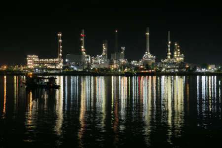 Oil refinery Riverside and Water reflection.の写真素材