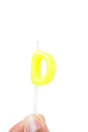 Birthday candles alphabet isolated on white background.の写真素材