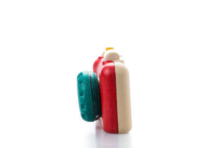 wooden toy camera on white background.の写真素材