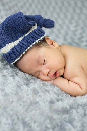 newborn baby on fabric gray,6 week old.の写真素材