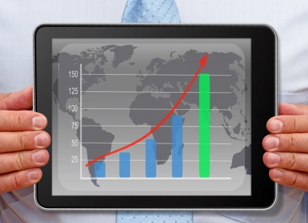 Businessman with Chart on Tablet PCの写真素材