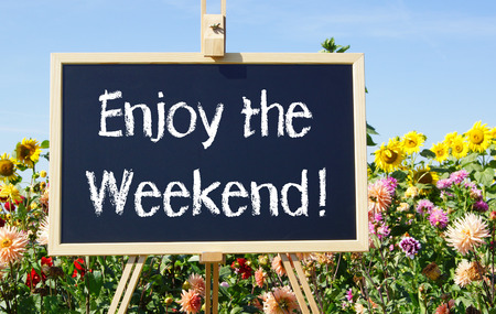 Enjoy the Weekend word on black board の写真素材
