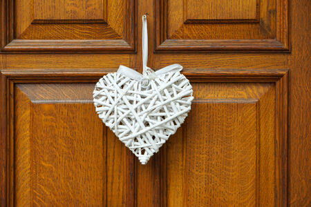 White Heart on wooden doorの写真素材