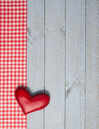 Red Heart on wooden backgroundの写真素材