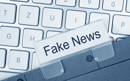 Fake News Folder on Computer Keyboardの写真素材