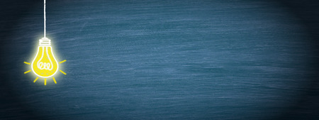 Great Idea and innovation - light bulb on blue backgroundの写真素材