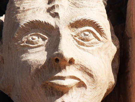 Wooden sculpture of a dragon womanの写真素材