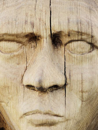 Wooden sculpture of a womanの写真素材