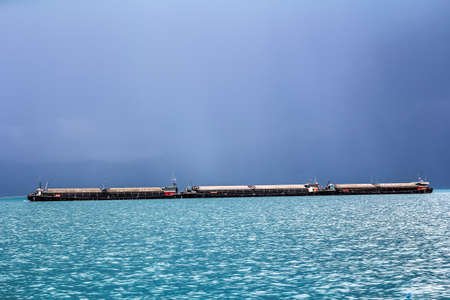 Worm boat in the stromの写真素材