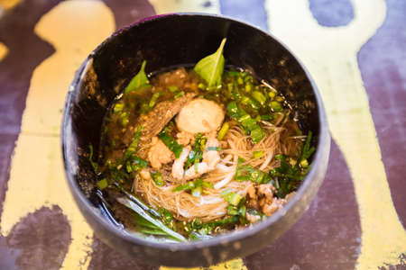 Thai noodle in coconut shellの写真素材