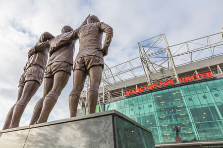 Manchester, England - February 28, 2016: To celebrate the 40th anniversary of United's first European Cup title, a statue of the club's holy trinity of George Best, Denis Law and Bobby Charltonのeditorial素材