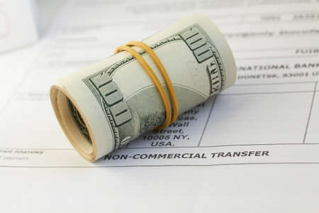 money, dollars isolated on white backgroundの写真素材