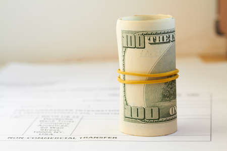 money, dollars isolated on white backgroundの写真素材