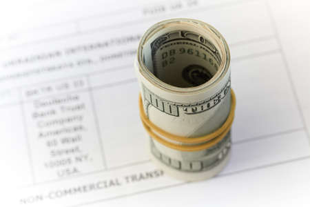 money, dollars isolated on white backgroundの写真素材